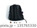 Everyday backpack for laptop and travel. Concept of getting ready for school, university, or office. Minimalist interior and travel readiness 135765330