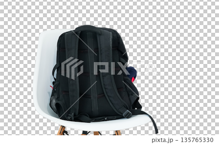 Everyday backpack for laptop and travel. Concept of getting ready for school, university, or office. Minimalist interior and travel readiness 135765330