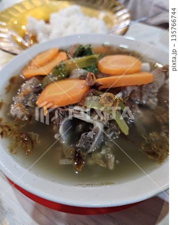 This is tradional food from Indonesia named sop iga This is tradional food from Indonesia named sop iga 135766744