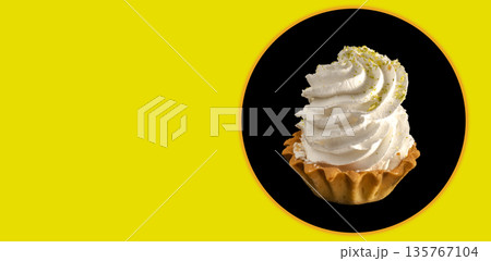 cake with protein cream on a black background, space for the text on a yellow background cake with protein cream on a black background, space for the text on a yellow background 135767104