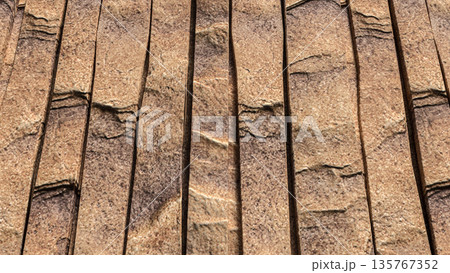 Natural Brown Stone Wall Vertical Panel Texture Background 3d render. 135767352