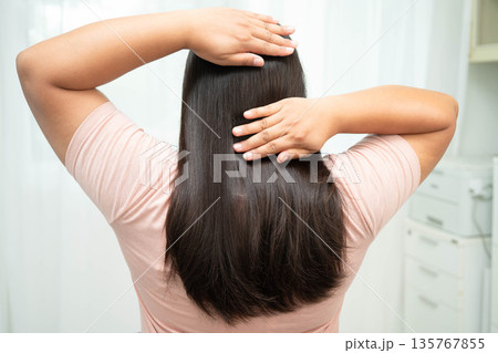 Woman with beautiful shine hair care treatment. 135767855