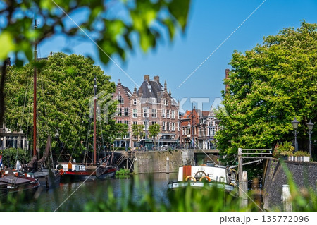 Scenic Rotterdam Canal View Historic Dutch Architecture and Boats on the Waterway landscape Scenic Rotterdam Canal View Historic Dutch Architecture and Boats on the Waterway landscape 135772096