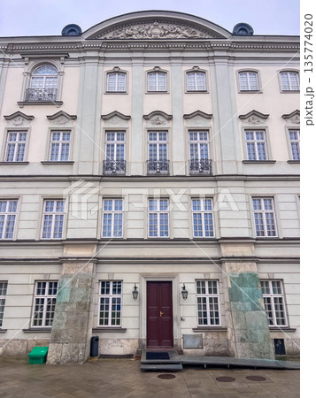 Building with many windows and a single door in Warsaw, Poland 135774020