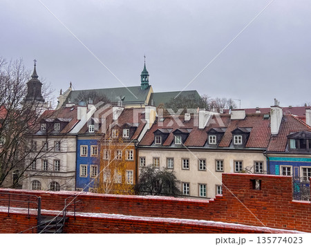 Colors of buildings in Warsaw on a cloudy day in Poland near the Barbican 135774023