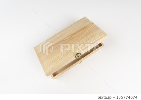 a small wooden storage box 135774674