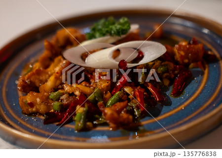 Stir fried meat with salt and chili, served on plate Stir fried meat with salt and chili, served on plate 135776838