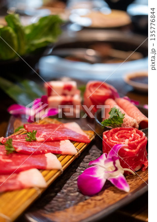 Various type of Japanese style sliced rare beef meat set on the plate, soft focus 135776844