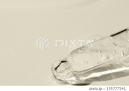 Transparent cosmetic product for skin care. Copy space Transparent cosmetic product for skin care. Copy space 135777541