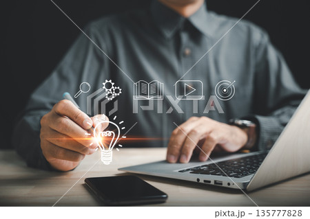 Educated hand uses a digital pen, laptop and e-learning platform, technology to enhance personalized learning, courses and internet learning for an educated business solution Educated hand uses a digital pen, laptop and e-learning platform, technology to enhance personalized learning, courses and internet learning for an educated business solution 135777828