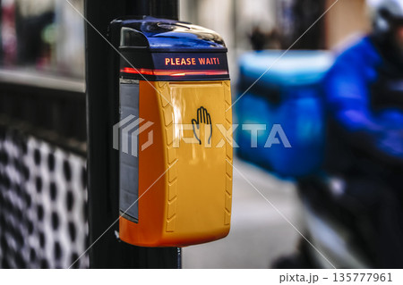 Pedestrian Crossing Signal Button with Please Wait Illuminated Text Pedestrian Crossing Signal Button with Please Wait Illuminated Text 135777961