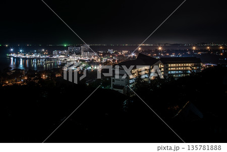 Laem Thaen with top view on Khao Sam Muk Mountain at night view of chonburi, Beautiful Khao Sam Muk view point twilight. 135781888