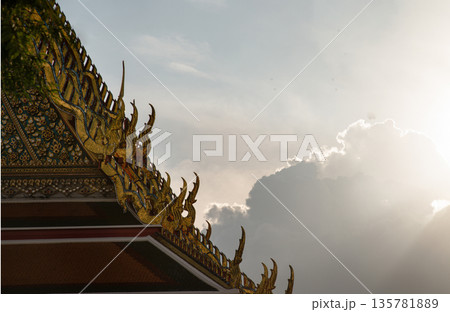 The roof of the Thai temple, along with the gable at the top of the temple roof that receives on beautiful sun. 135781889