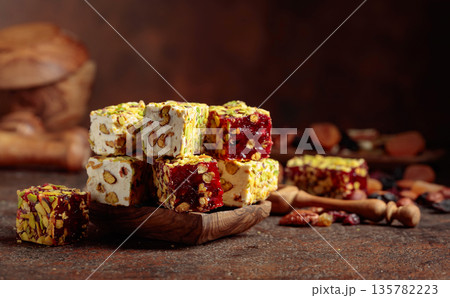 Turkish delight with nuts and dried fruits. 135782223