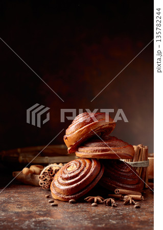 Freshly baked sweet cinnamon buns. 135782244
