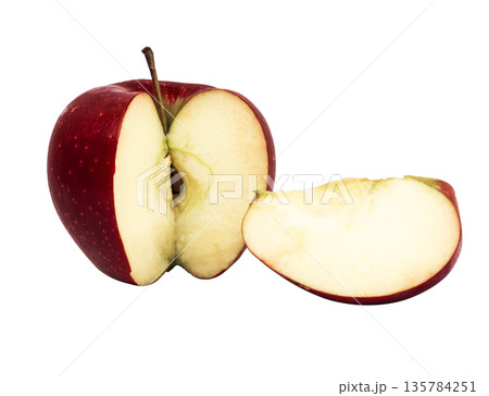 Ripe apple of red filling and a cut part from it on a white background in isolation 135784251