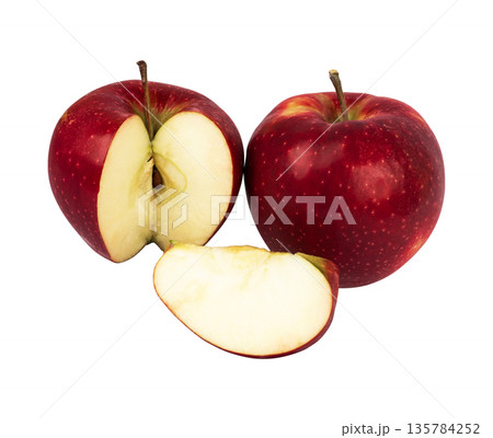 Ripe apple of red filling and a cut part from it and a whole apple on a white background in isolation Ripe apple of red filling and a cut part from it and a whole apple on a white background in isolation 135784252