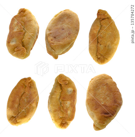 Fried homemade pies, collage, on a white background in isolation Fried homemade pies, collage, on a white background in isolation 135784272
