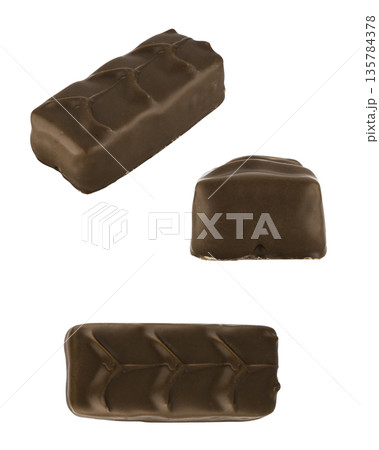 Bar covered with chocolate, on a white background in isolation Bar covered with chocolate, on a white background in isolation 135784378