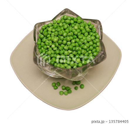 green peas separated from the shell, pea seeds, lies in glassware and on a square plate, on a white background in isolation green peas separated from the shell, pea seeds, lies in glassware and on a square plate, on a white background in isolation 135784405