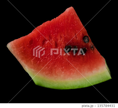 Piece of ripe watermelon on black background isolated 135784431