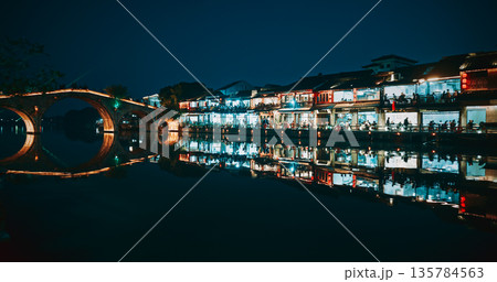 Canal Side Shops and Dining with Perfect Reflection at Night. Zhujiajiao, Shanghai, China 135784563