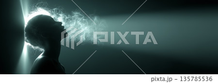 Silhouette of woman in light ray leaving darkness. Female silhouette standing in a beam of light, symbolizing hope and new beginnings 135785536