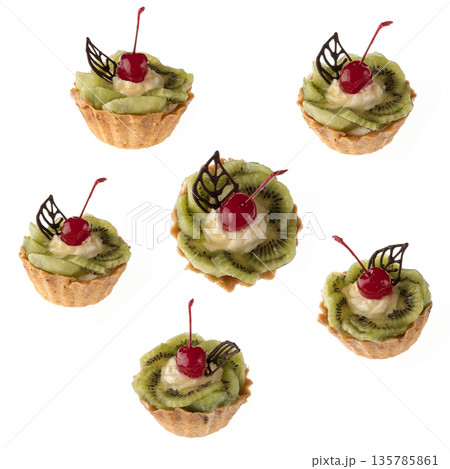 Dessert, cake with kiwi and cherries, on a white background in isolation, collage 135785861