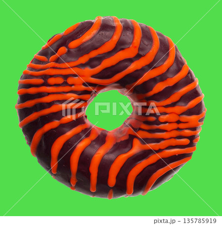 lush donut covered with cream, on a green background 135785919