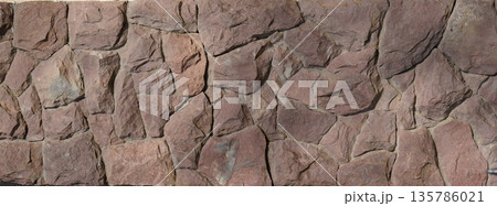 texture masonry from uneven stone, decorative wall background 135786021