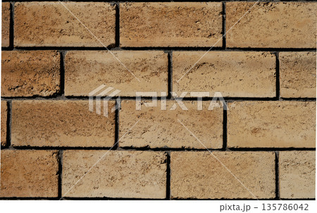 Slick, even wall of straight, straight cinder blocks and with cement joints between them 135786042