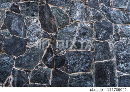 Wall of uneven natural stone, decorative wall, texture, background 135786045