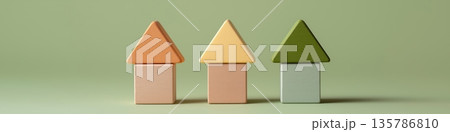 Wooden building blocks forming conceptual house architecture. Wooden blocks depict a row of simple houses representing real estate and community Wooden building blocks forming conceptual house architecture. Wooden blocks depict a row of simple houses representing real estate and community 135786810