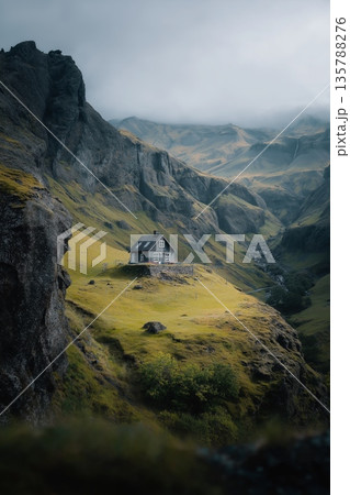 Icelandic valley with impressive green mountains and dramatic sky. Lush green Icelandic valley with rugged mountains under a cloudy sky Icelandic valley with impressive green mountains and dramatic sky. Lush green Icelandic valley with rugged mountains under a cloudy sky 135788276