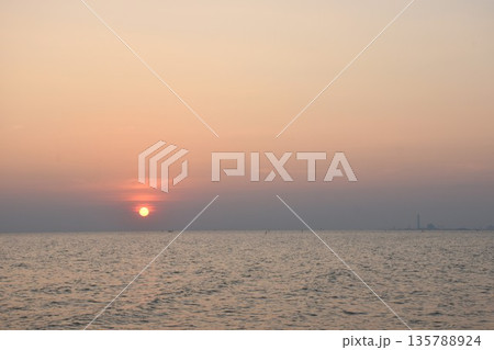 landscape of sea on sunset at Rayong estuary or mouth of river travel location in Thailand landscape of sea on sunset at Rayong estuary or mouth of river travel location in Thailand 135788924