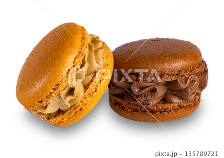 Two macarons creamy isolated on white background. Two macarons creamy isolated on white background. 135789721