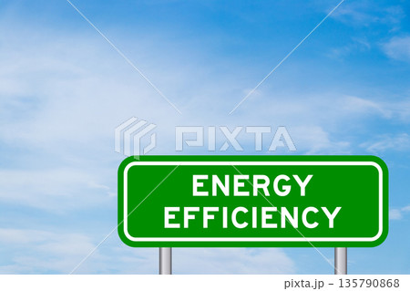 Green color transportation sign with word energy efficiency on blue sky with white cloud background 135790868