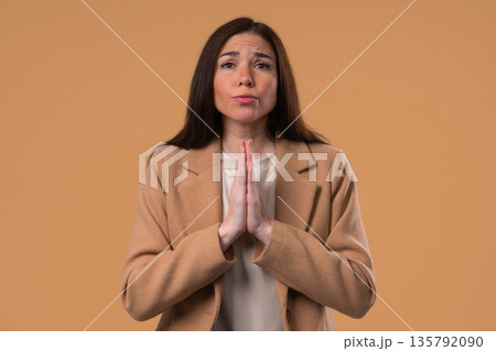 Young Businesswoman Praying With Palms In Sincere Silent Request. Hope, Faith 135792090