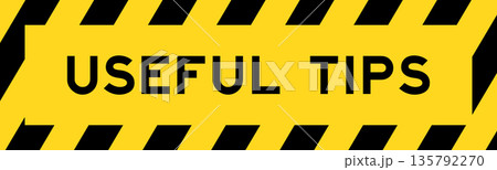 Yellow and black color with line striped label banner with word useful tips 135792270