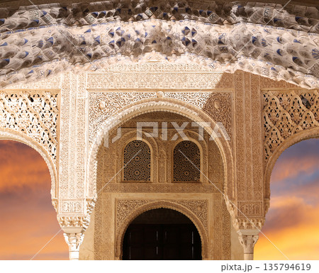 Arches in Islamic (Moorish) style (against the sunset) in Alhambra, Granada, Spain Arches in Islamic (Moorish) style (against the sunset) in Alhambra, Granada, Spain 135794619
