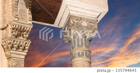 Arches in Islamic (Moorish) style (against the sunset) in Alhambra, Granada, Spain Arches in Islamic (Moorish) style (against the sunset) in Alhambra, Granada, Spain 135794643