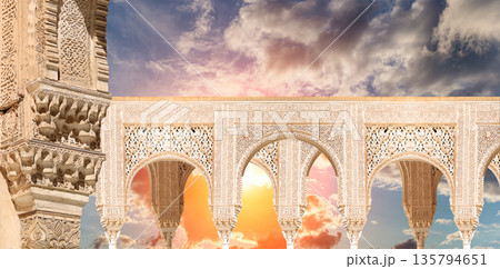 Arches in Islamic (Moorish) style (against the sunset) in Alhambra, Granada, Spain Arches in Islamic (Moorish) style (against the sunset) in Alhambra, Granada, Spain 135794651