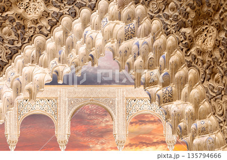 Arches in Islamic (Moorish) style (against the sunset) in Alhambra, Granada, Spain  135794666