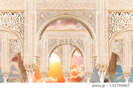 Arches in Islamic (Moorish) style (against the sunset) in Alhambra, Granada, Spain  135794667