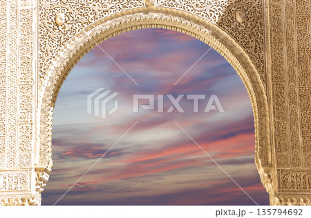 Arches in Islamic (Moorish) style (against the sunset) in Alhambra, Granada, Spain Arches in Islamic (Moorish) style (against the sunset) in Alhambra, Granada, Spain 135794692