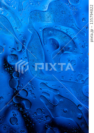Deep blue fluid surface with organic shapes, modern abstract design. Deep blue fluid surface with organic shapes, modern abstract design. 135794822