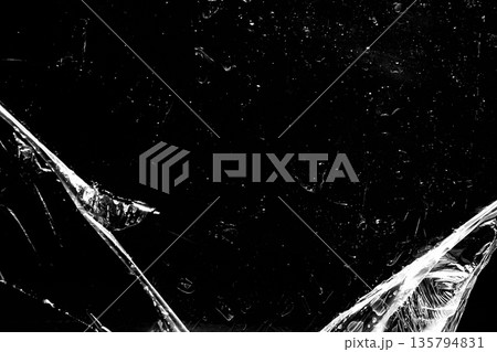 Black background with sharp white scratches, high-contrast grunge texture. Black background with sharp white scratches, high-contrast grunge texture. 135794831