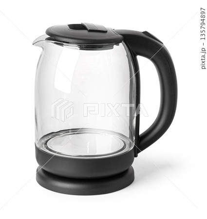 Glass electric kettle standing on white background 135794897