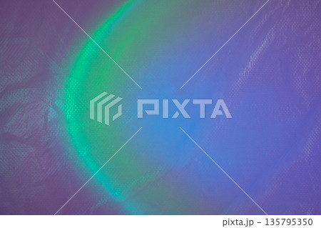 Abstract green and blue light creating vibrant gradient background texture 135795350