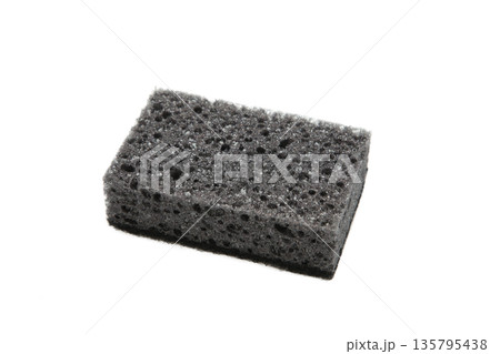 New absorbent black sponge isolated on white background. Black kitchen sponges. 135795438